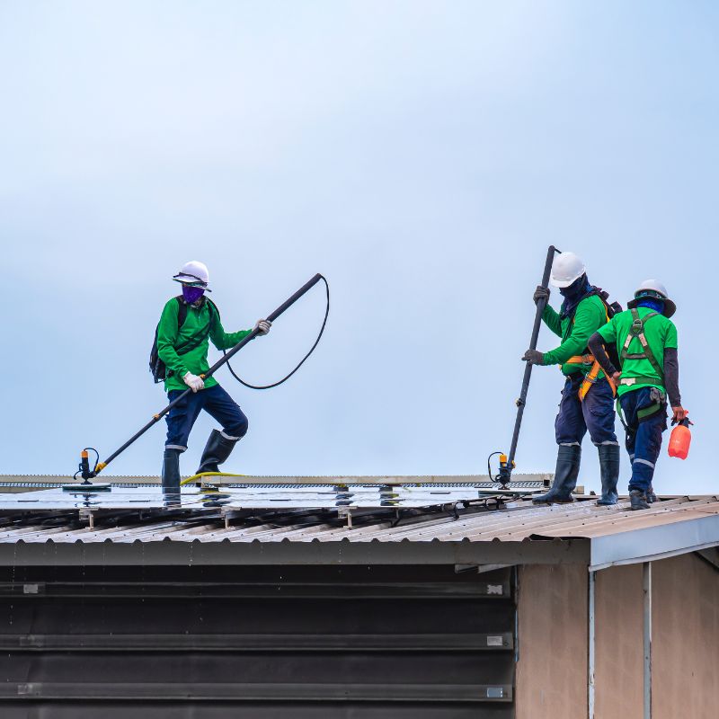 TM Roofing crew performing roof work Rhode Island