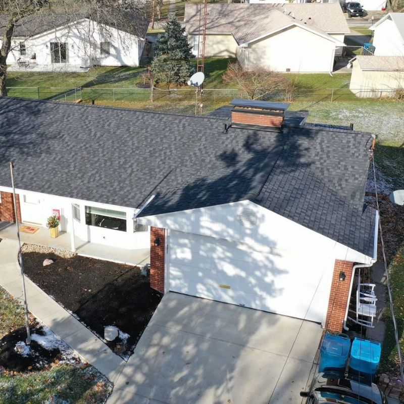 Clogged gutter cleaned by TM Roofing Rhode Island